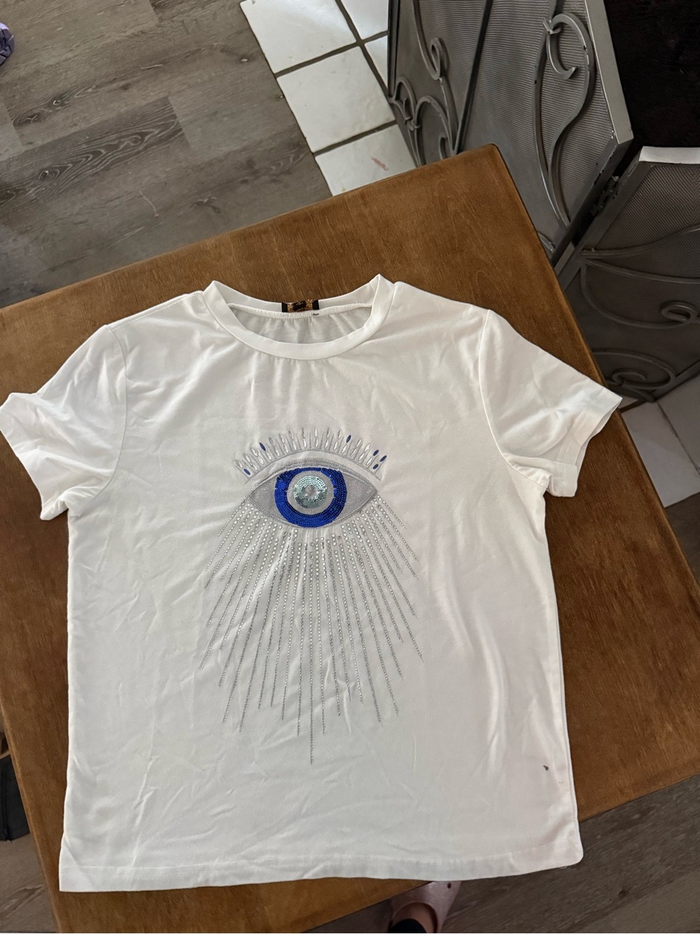 White Men's T-Shirt with Blue Evil Eye Graphic